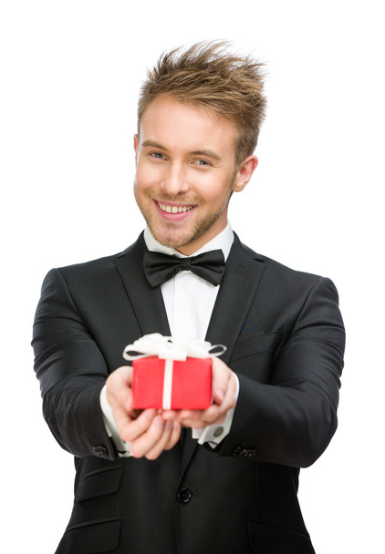 Businessman keeping gift box - Foto, immagini