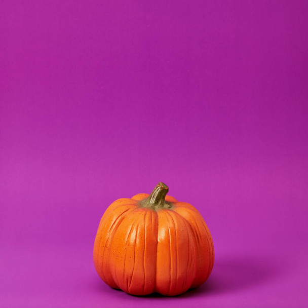 Happy Halloween Pumpkin Decoration purple background. minimal - Photo, Image