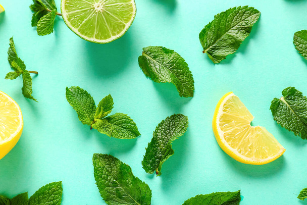 Aromatic mint and citrus fruits on color background - Valokuva, kuva