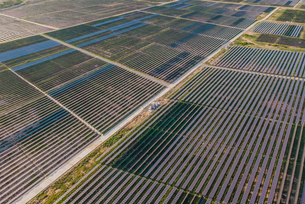 Aerial view of the solar panel in solar farm for green energy - Φωτογραφία, εικόνα