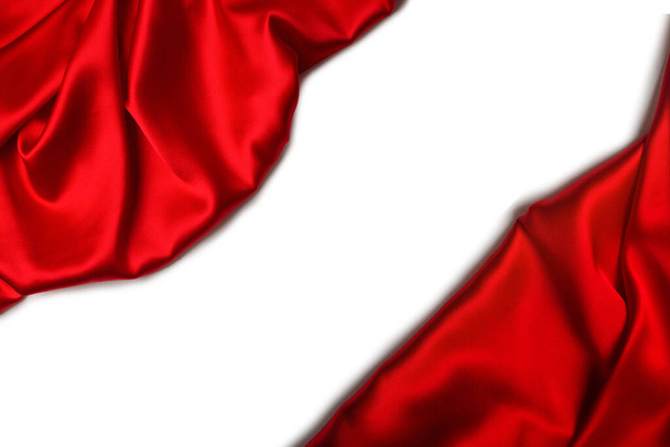 Czerwony jedwab lub satynowa, luksusowa tkanina może być wykorzystywana jako abstrakcyjne tło. Widok z góry. - Zdjęcie, obraz