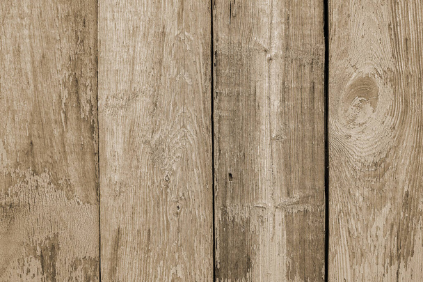 Wooden background of old boards with cracked and peeling paint. - Photo, image