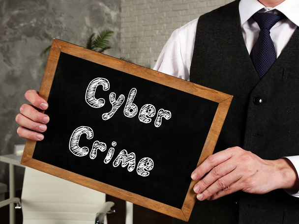 サイバー犯罪を意味するビジネスコンセプトページ上の碑文. - 写真・画像