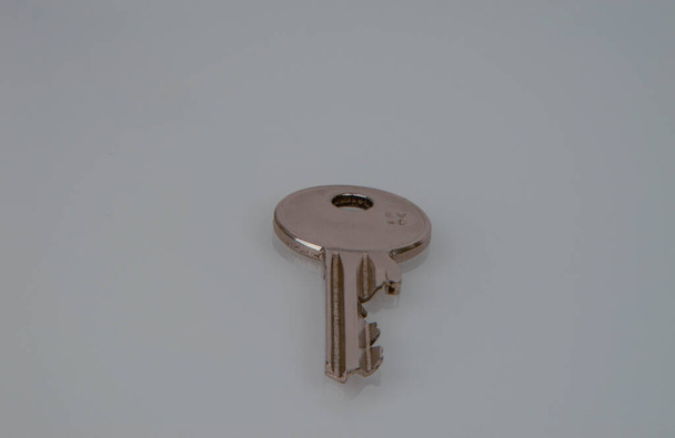 Closeup of metal keys with Copyspace and white background - Photo, Image