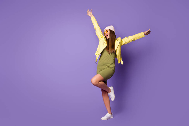 Full length body size view of her she nice-looking attractive fashionable cheerful cheery girl dancing having fun isolated over bright vivid shine vibrant lilac purple violet color background - 写真・画像