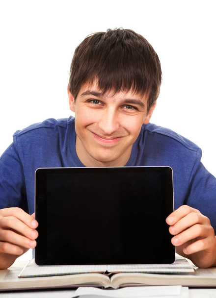 Young Man show a Tablet Computer on the School Desk Isolated on the White - Foto, afbeelding