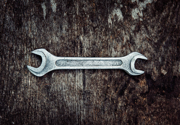 Tool on the Grunge Wooden Background closeup - Foto, afbeelding