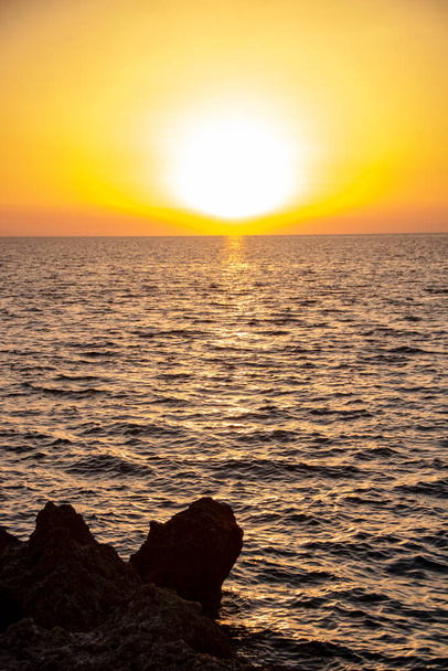 breathtaking sunset on te coast of Diamante, Calabria region, Italy - Photo, Image