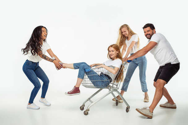 Group of adorable multiethnic friends having fun isolated over white studio background - Fotografie, Obrázek