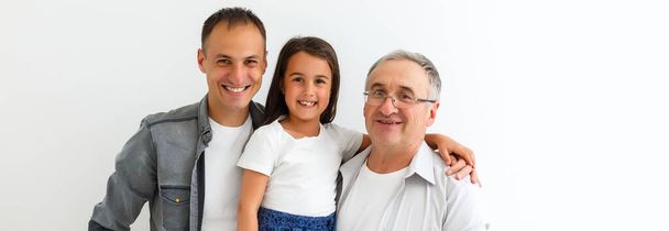 Indian asian family sitting over white background - Foto, immagini