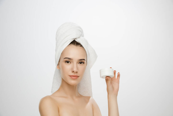 Beauty Day. Woman wearing towel isolated on white studio background - Zdjęcie, obraz