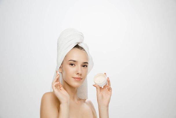 Beauty Day. Woman wearing towel isolated on white studio background - Fotografie, Obrázek