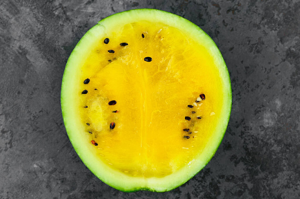yellow watermelon cut in half. High quality photo - Foto, Imagem