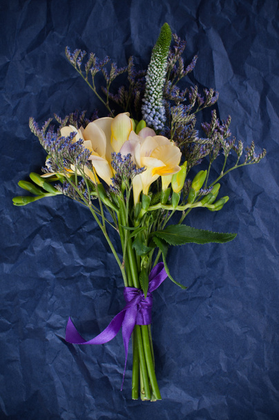 flowers and blue wrapping paper - Photo, Image