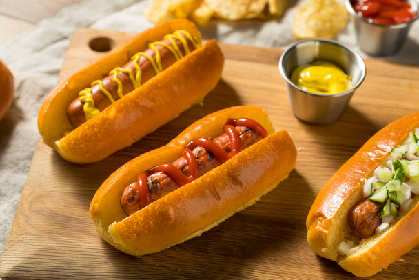 Healthy Homemade Turkey Hot Dogs with Ketchup Mustard and Onion - Photo, Image