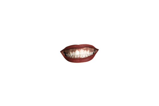 Close-up view of female mouth wearing red lipstick isolated on white studio background - Foto, Bild