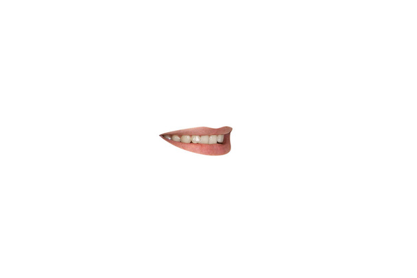 Close-up view of female mouth wearing lipstick isolated on white studio background - Photo, image