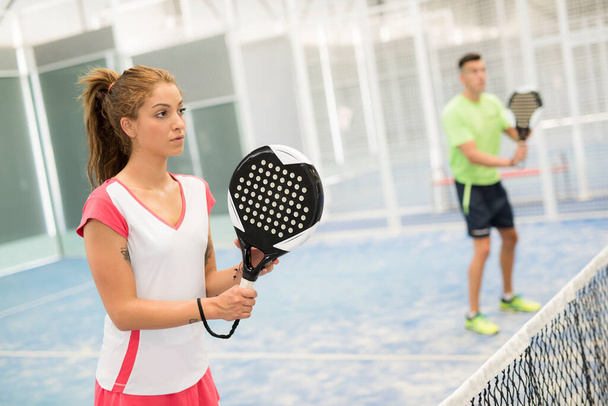 paddle tennis couple indoors training indoors - Foto, Bild