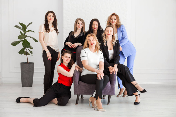 Happy women work team employees group looking at camera posing in studio, smiling women company staff workers, workforce members, business people managers standing together, portrait. Horizontal photo - Fotoğraf, Görsel