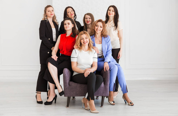 Happy women work team employees group looking at camera posing in studio, smiling women company staff workers, workforce members, business people managers standing together, portrait. Vodorovná fotografie - Fotografie, Obrázek