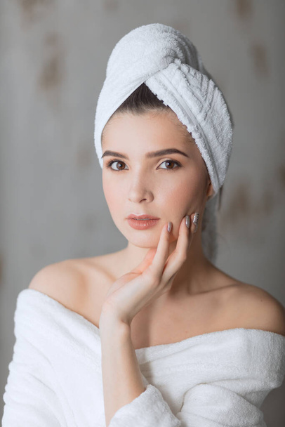 Spa Woman. Attractive woman feeling her skin smooth and well-groomed after bath. - Valokuva, kuva