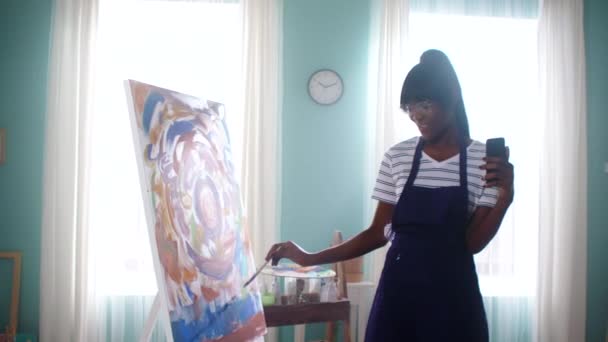 Black Woman Is Painting and Filming Vlog - Footage, Video