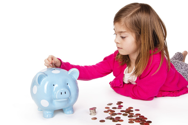 Lapsi säästää rahaa säästöpossu
 - Valokuva, kuva