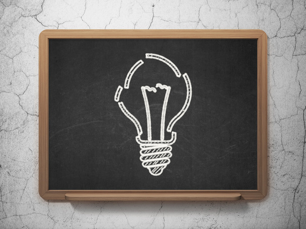 Business concept: Light Bulb on chalkboard background - Foto, imagen