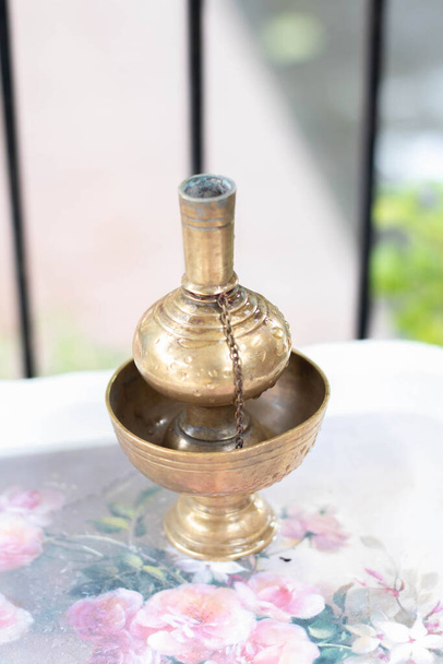 Brass water bottle for Buddhism - Photo, Image