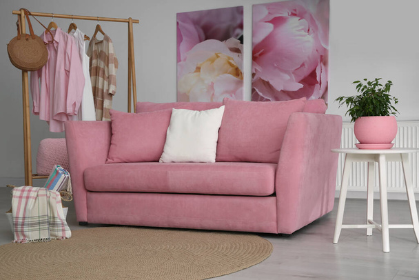 Modern comfortable sofa in stylish living room interior - Φωτογραφία, εικόνα