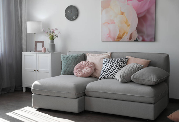 Elegant living room with comfortable sofa. Interior design - Foto, imagen