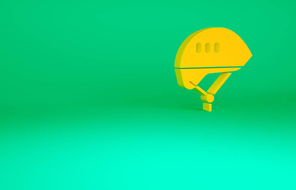 Оранжевый значок велосипедного шлема выделен на зеленом фоне. Экстремальный спорт. Спортивное оборудование. Концепция минимализма. 3D-рендеринг. - Фото, изображение