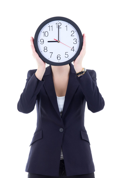 jovem mulher em um terno de negócio segurando o relógio do escritório - Foto, Imagem