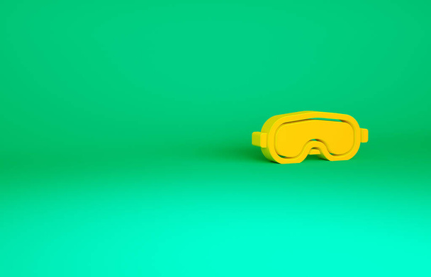 Pomarańczowe okulary narciarskie ikona izolowane na zielonym tle. Ekstremalny sport. Urządzenia sportowe. Koncepcja minimalizmu. Ilustracja 3D 3D renderowania. - Zdjęcie, obraz