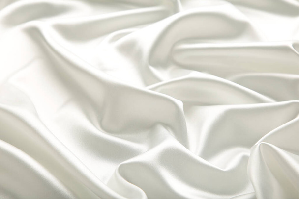 Smooth elegant white silk can use as background. Top view - Zdjęcie, obraz
