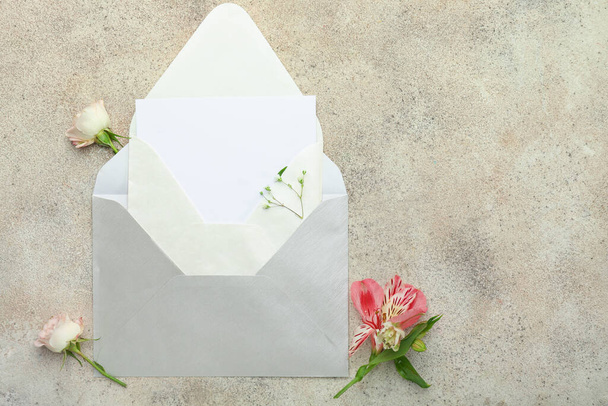 Blank card and envelope on grey background - Photo, Image