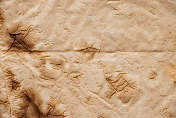 Армянский лаваш с паприкой в качестве фона крупным планом - Фото, изображение