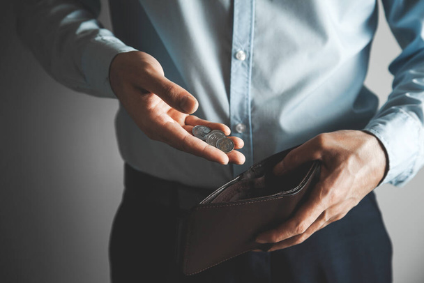 man hand wallet with coins  - Фото, изображение