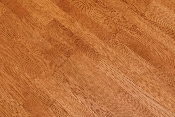 Brown laminate floor texture background. natural wooden polished surface parquet - Photo, image