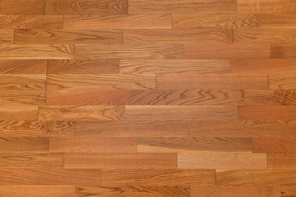 Fond de texture de plancher stratifié brun. parquet de surface poli en bois naturel - Photo, image