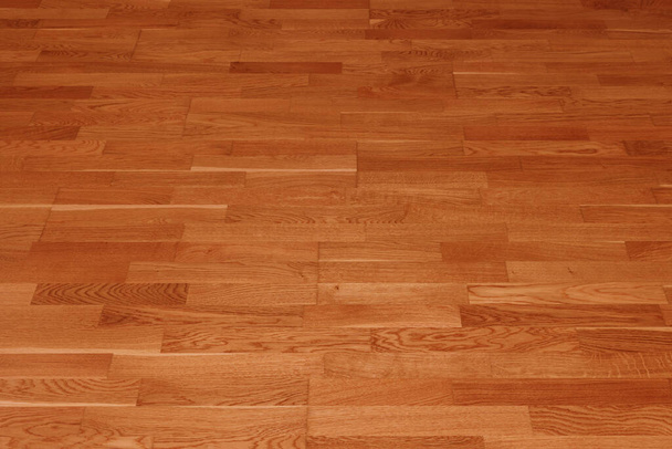 Fondo de textura de piso laminado marrón. parquet superficie pulida de madera natural - Foto, imagen