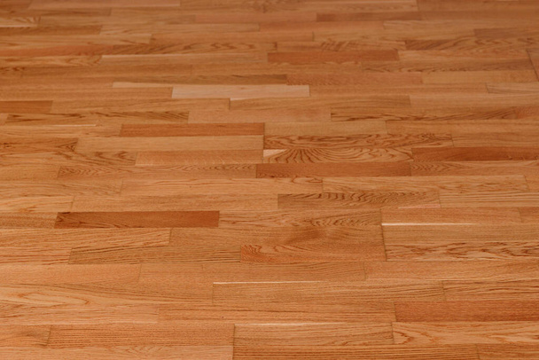 Brązowy laminat tekstury podłogi tle. naturalny drewniany, polerowany parkiet powierzchniowy - Zdjęcie, obraz