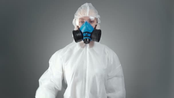 Images du médecin en costume de protection avec masque - Séquence, vidéo