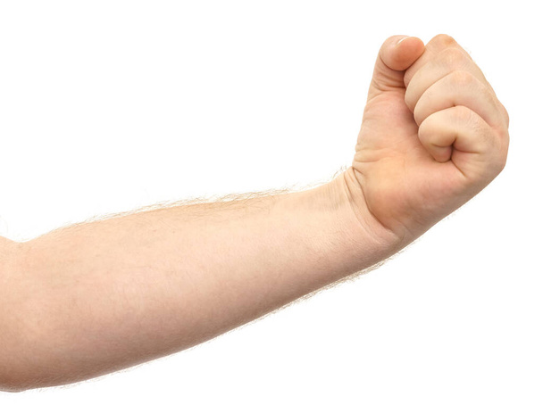 Mužská ruka ukazuje gesto pěst izolovat na bílém pozadí - Fotografie, Obrázek