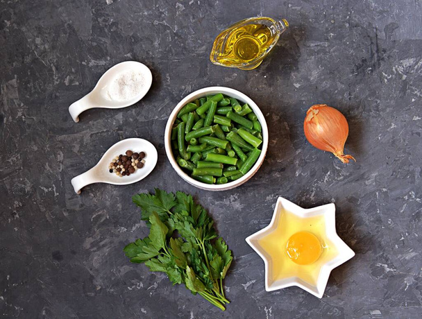 Ingredients for cooking green asparagus beans with scramble egg. Georgian cuisine. Top view, copy space. - Photo, image