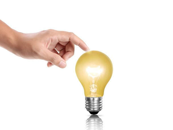 bulb light in a hand - Фото, зображення