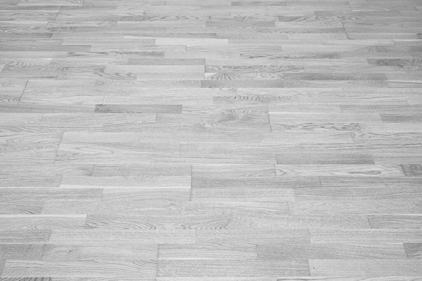 Naadloze witte laminaat vloer textuur achtergrond. Grijs houten gepolijst oppervlakte parket - Foto, afbeelding