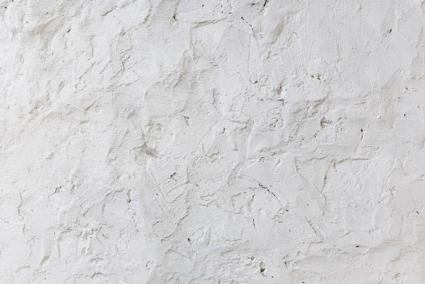 Bezszwowe białe szorstkie betonowe tło ścianki. ściana cementowa. tekstura gipsu. puste dla projektanta - Zdjęcie, obraz