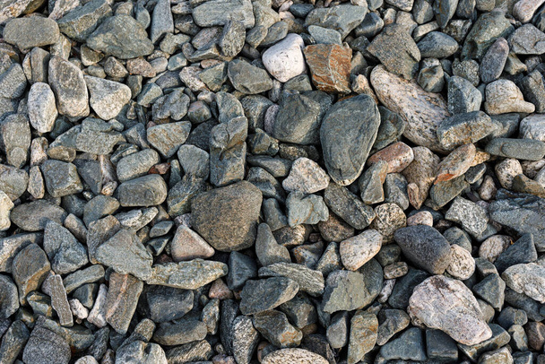 Pequeño camino de piedra de fondo, grava guijarros textura de piedra, granito, mármol - Foto, imagen