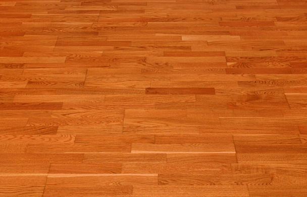 Fond de texture de plancher stratifié brun sans couture. parquet de surface poli en bois naturel - Photo, image
